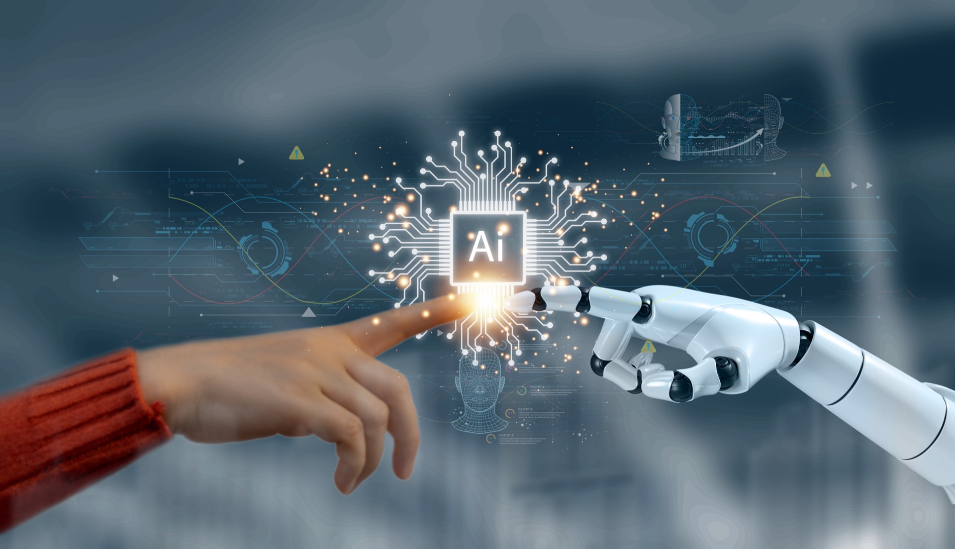 人の手とロボットの手がAIチップに触れるイメージ